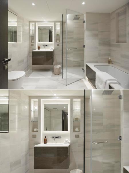 Нейтральная ванная комната со стеклянной душевой кабиной и зеркалом с подсветкой.