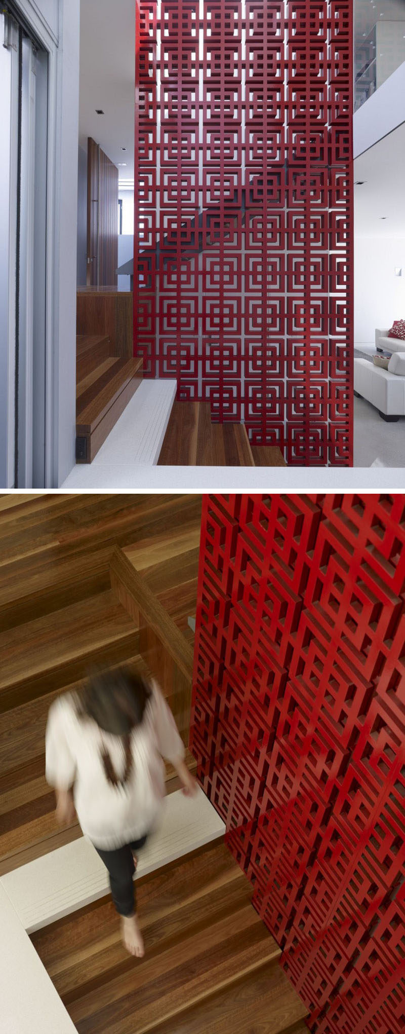 Красные перила безопасности с рисунком на этих деревянных лестницах добавляют артистичности и смелости этому современному дому.