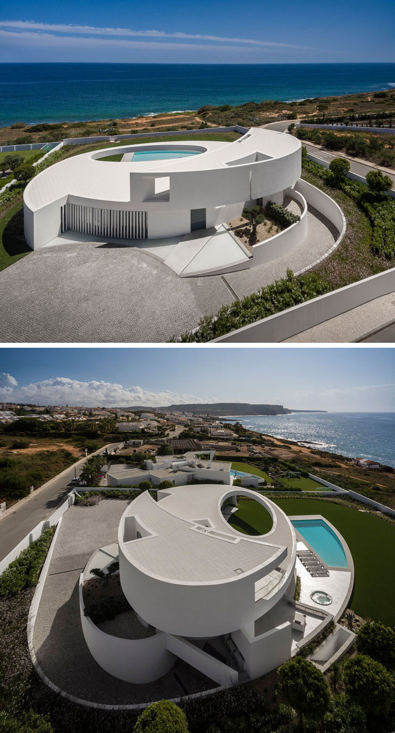  Ателье Марио Мартинс спроектировало этот современный и скульптурный дом в Лузе, Португалия, в геометрической форме эллипса 