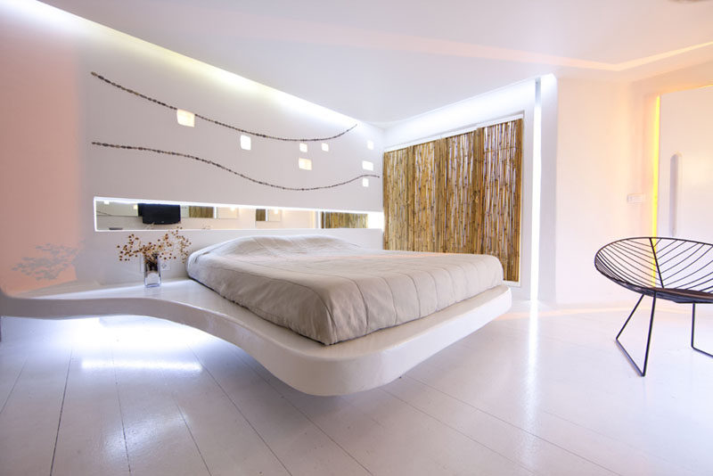 Идеи дизайна гостиничных номеров для использования в собственной спальне // Создайте иллюзию парящей кровати.