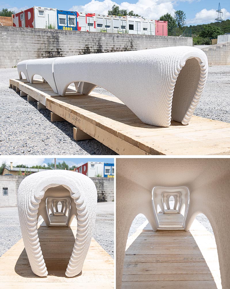 Белая бетонная уличная скамейка, напечатанная на 3D-принтере.