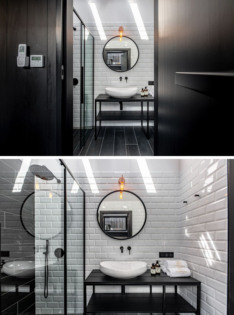 Идеи для ванных комнат - В этой современной ванной комнате с черным туалетным столиком, черным полом и черной душевой кабиной представлены черные элементы дизайна. Белая плитка и световые люки помогают сохранить яркость комнаты. #BlackBathroom #BathroomIdeas # Bathroom # ModernBathroom