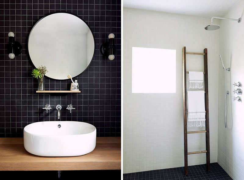 В этой современной ванной комнате квадратная черная плитка контрастирует с белыми стенами, а деревянный туалетный столик и лестница у душа естественности. # Ванная # Современная ванная # Минималистичная