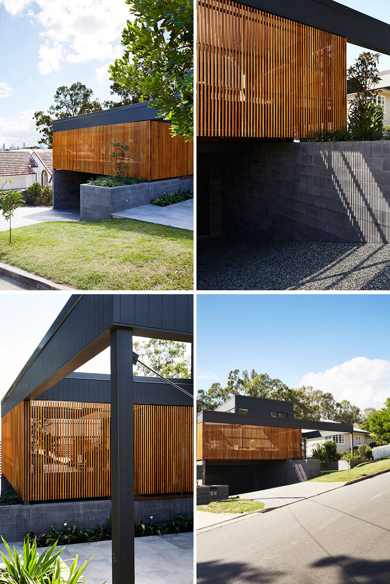  Этот современный черный дом украшен деревянными планками, которые скрывают собственное патио. #ModernHouse #ModernArchitecture 