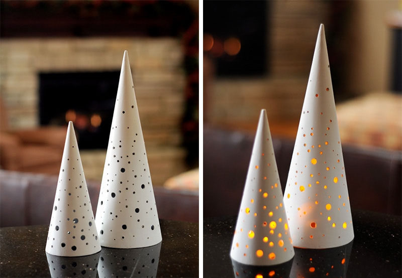 30 современных идей рождественского декора для вашего дома // Поддельные чайные свечи, размещенные под перфорированными елками, создают теплое сияние и добавляют уюта вашему дому.