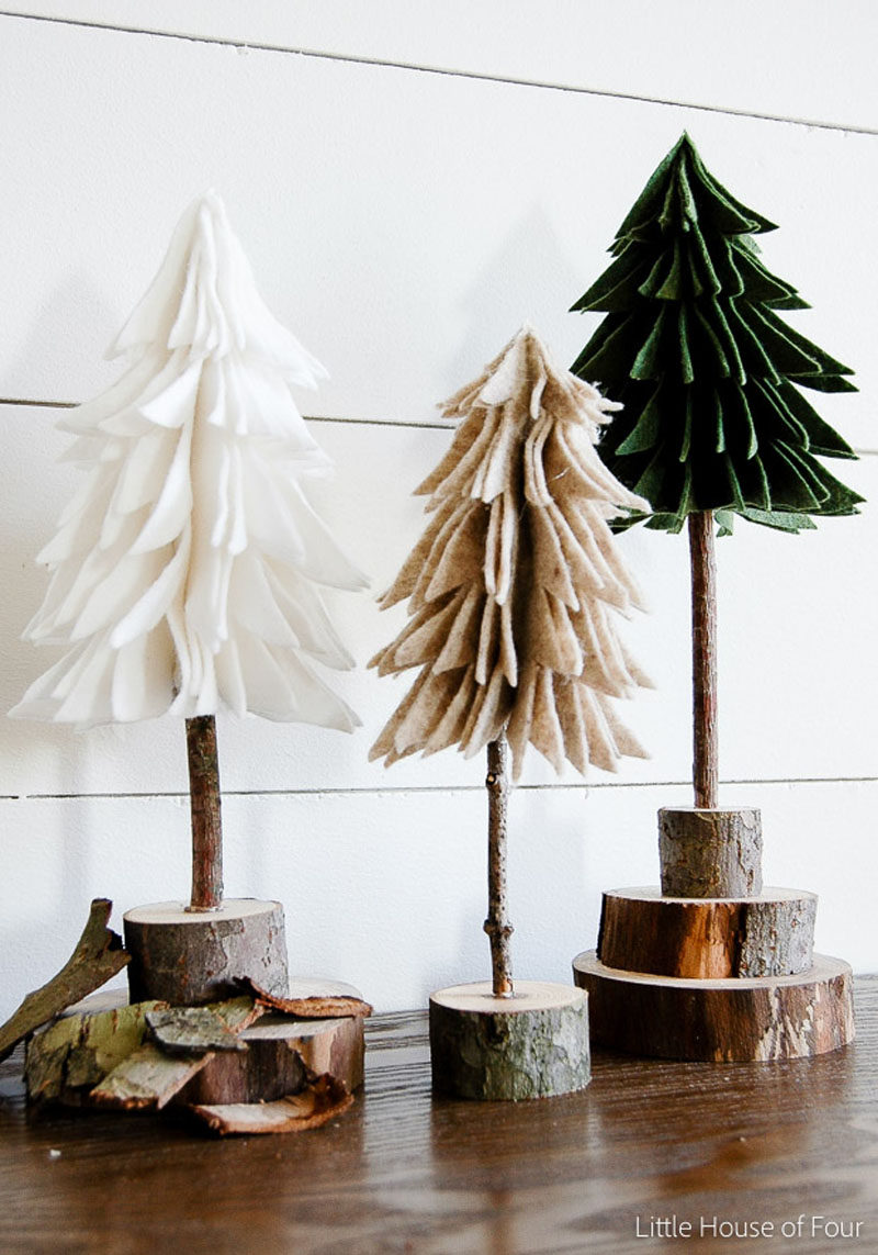 30 современных идей рождественского декора для вашего дома // Эти фетровые и деревянные деревья привносят немного природы в ваш декор и помогают сделать ваше пространство теплее и уютнее.