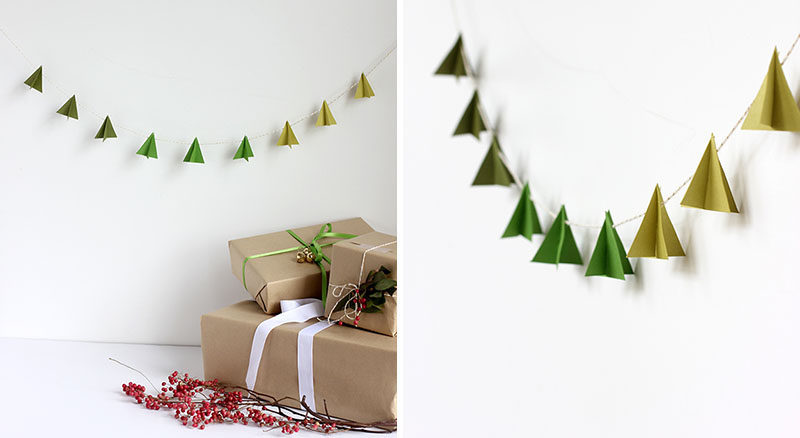 30 современных идей рождественского декора для вашего дома // Добавьте минималистичный праздничный декор к своим стенам с помощью этих бумажных елок, висящих на праздничной веревке.