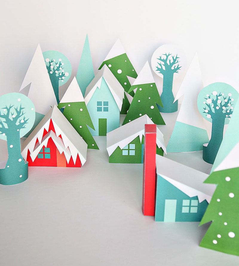 30 современных идей рождественского декора для вашего дома // Эта бумажная деревня для печати в веселых тонах с современными домами создает веселую зимнюю сцену, которую можно использовать снова и снова на протяжении многих лет.