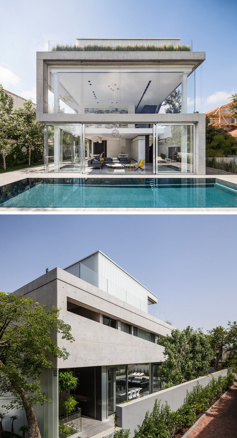 13 Экстерьеры современных домов из бетона | Бетон и стекло были использованы в дизайне этого современного дома, чтобы он оставался светлым, воздушным и открытым.