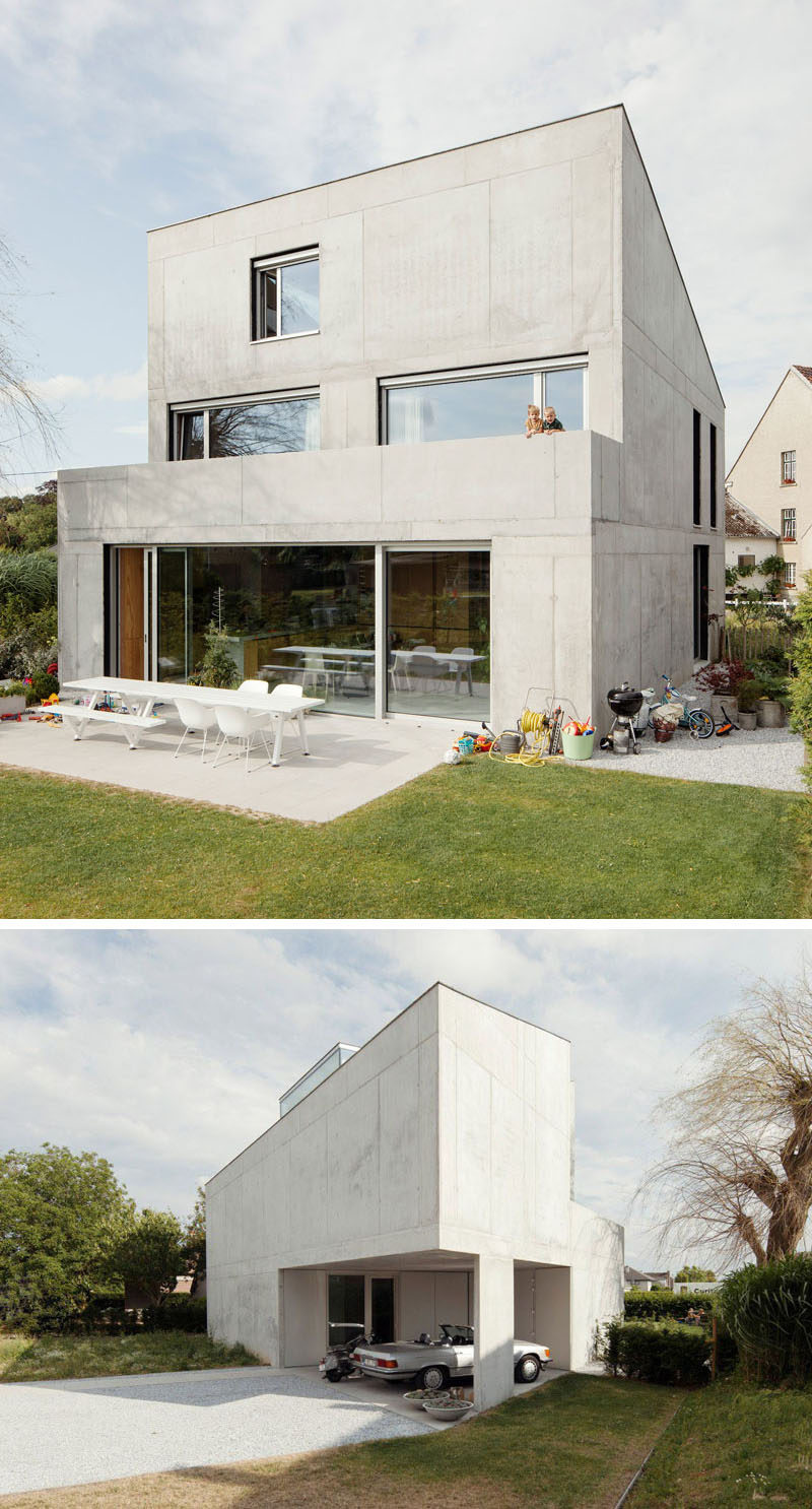 13 Экстерьеры современных домов из бетона | Сплошная бетонная стена в передней части дома резко контрастирует с более открытой задней частью дома.