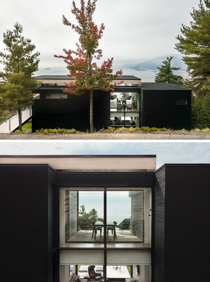По прибытии в этот современный дом, зрелая растительность окружает дом, а темный фасад дома сливается с цветом коры близлежащих деревьев. #ModernHouse # Архитектура # Окна