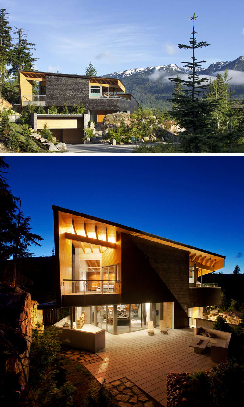 16 примеров современных домов с наклонной крышей | Большая покатая крыша этого современного горного дома создает ощущение открытости и уединения.