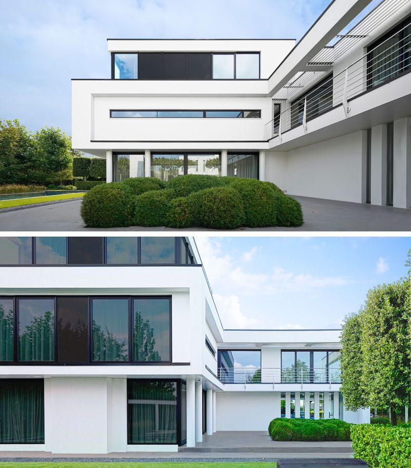 В дизайне этого современного дома использованы большие окна уникальной формы, обеспечивающие либо уединение, либо беспрепятственный вид на окружающую зелень. #Windows #ModernHouse #ModernArchitecture