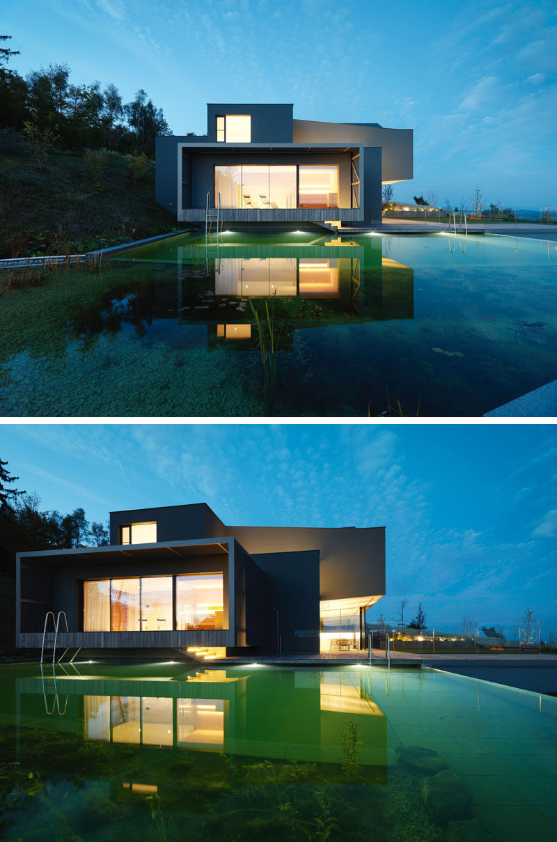 WILLL Architektur спроектировал новый современный дом в Австрии с панорамным видом на окрестности и естественным бассейном. #ModernArchitecture #ModernHouse #NaturalSwimmingPool