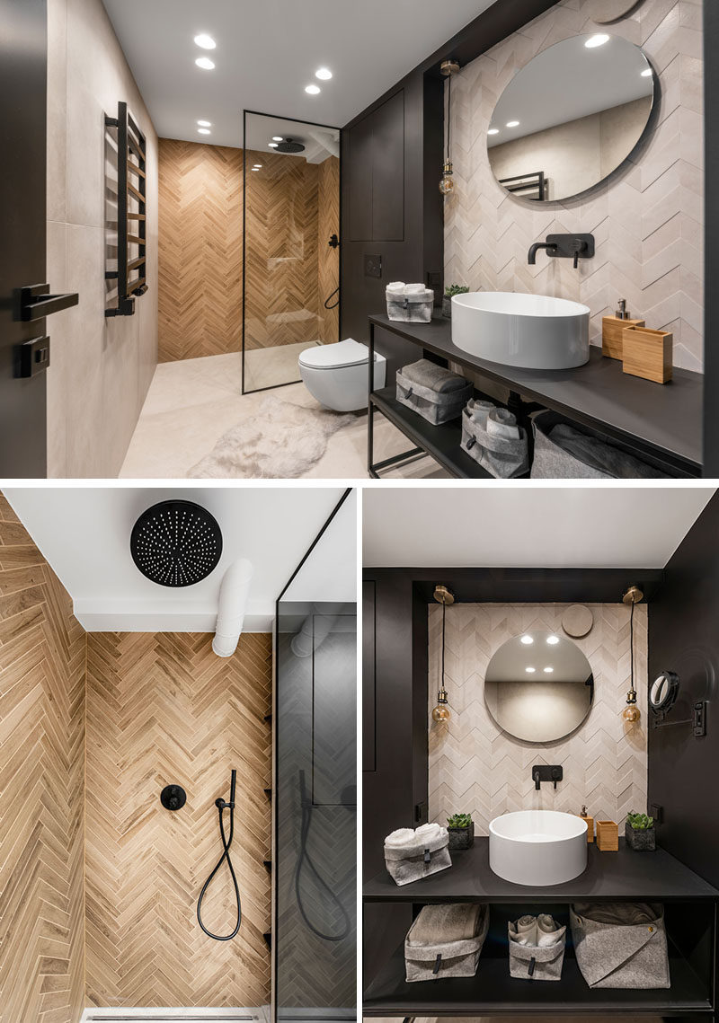 Эта современная ванная комната украшена плиткой, уложенной как в елочку, так и в шеврон. # СовременнаяВанная # ЧернаяВанная # ИнтерьерДизайн