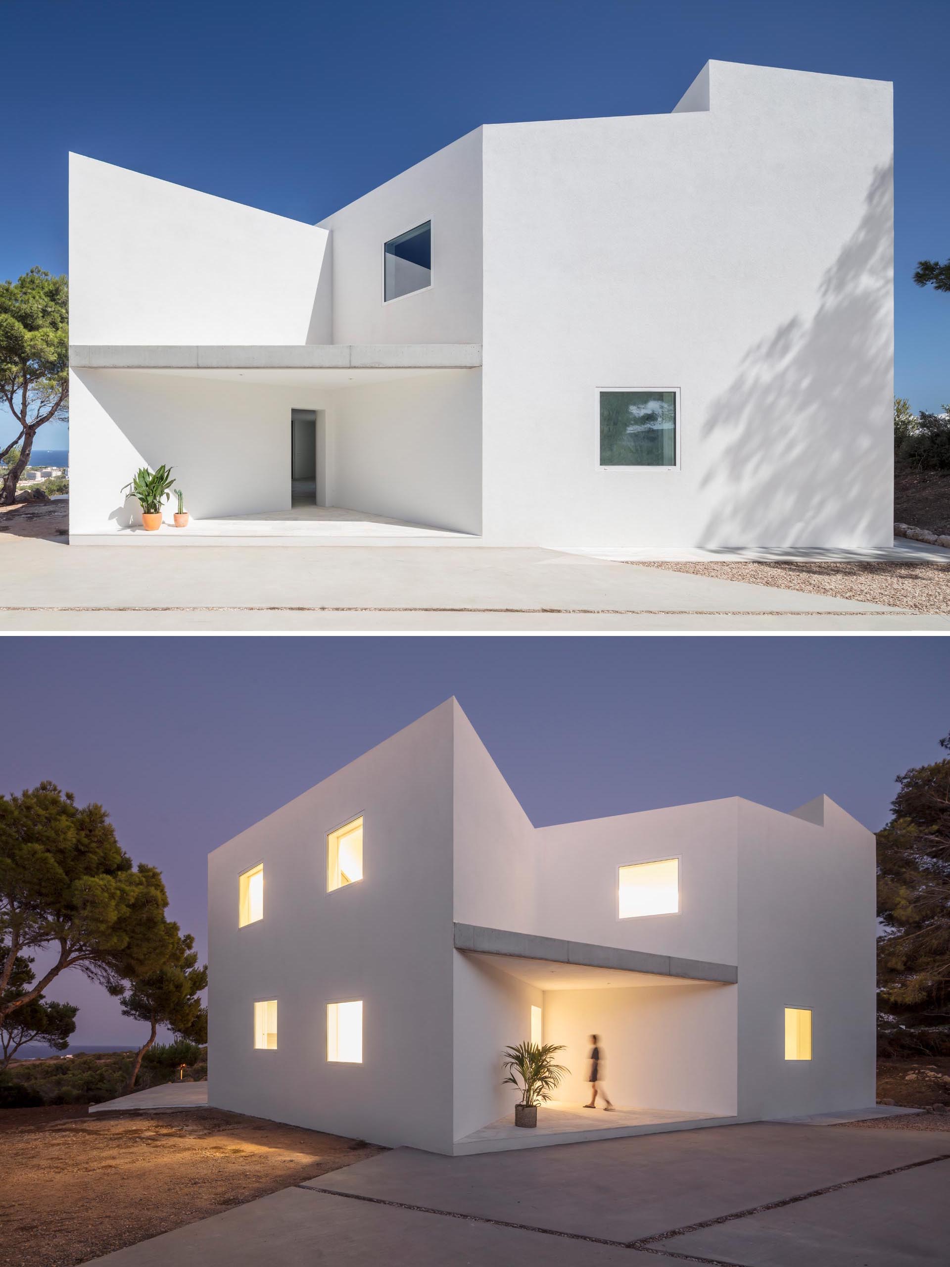 Современный белый дом с угловым дизайном.