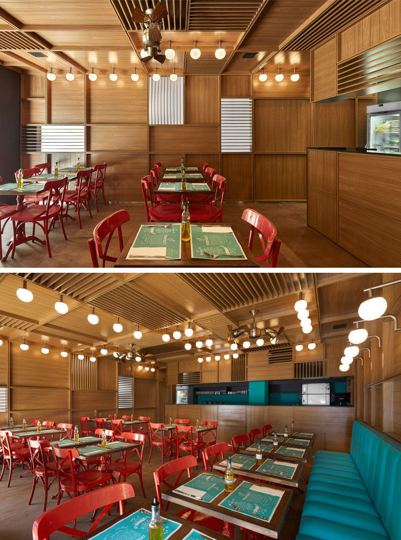  В этом современном ресторане красные стулья были использованы для добавления цвета, а освещение, разработанное архитектором, вместе с латунными вентиляторами Gerbar украшает потолок. #RestaurantDesign #ModernRestaurant 