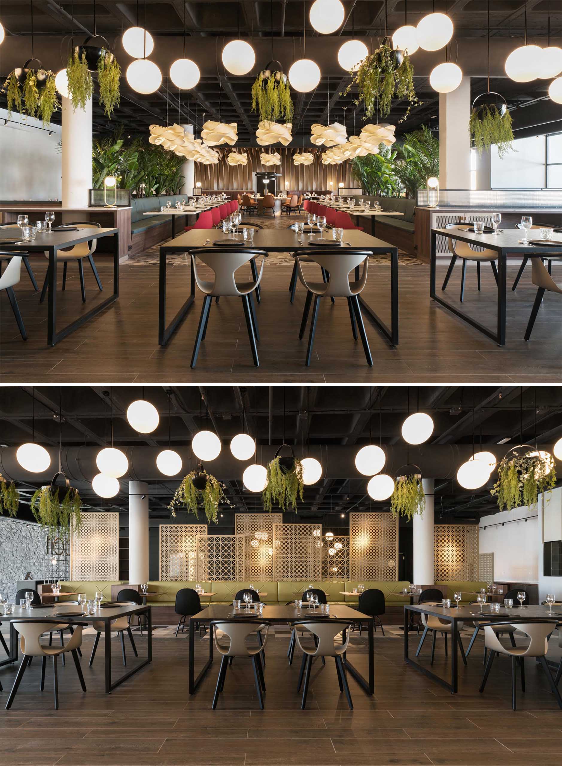 Современный ресторан с зеленью, несколькими зонами отдыха и большим количеством освещения.