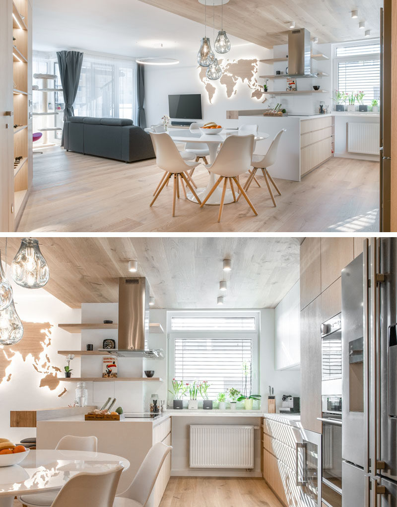 Идеи для кухни - эта небольшая кухня имеет U-образную форму, с зоной приготовления пищи слева и зоной уборки справа. Небольшая часть столешницы под окном соединяет две зоны. #KitchenDesign #ModernKitchen #KitchenIdeas