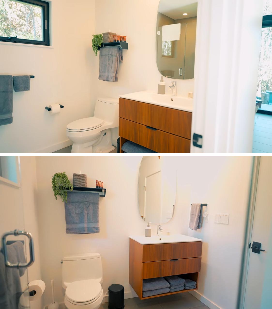 Крошечная домашняя ванная комната с деревянным туалетным столиком, изогнутым зеркалом и застекленной душевой кабиной.