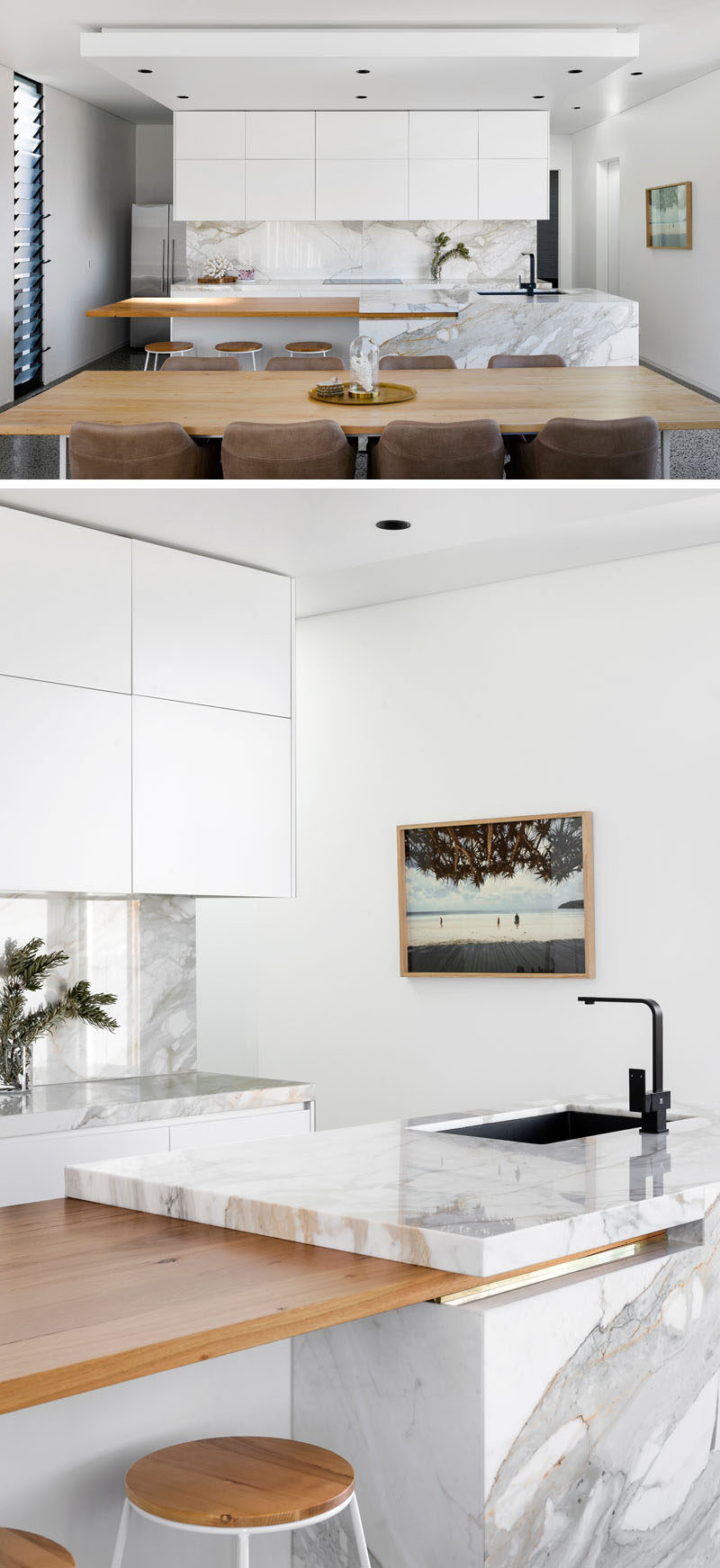 В этой кухне белая мебель сочетается с камнем и деревянной столешницей, что придает современный вид. #ModernKitchen #KitchenDesign