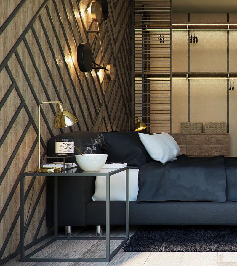 Стена с акцентом на теплую древесину в этом современном интерьере украшена черными полосами, образующими геометрический узор и дополняющими квадратные прикроватные тумбочки и выбор мебели. #BedroomAccentWall #AccentWall #FeatureWall #BedroomDesign # BlackDecor