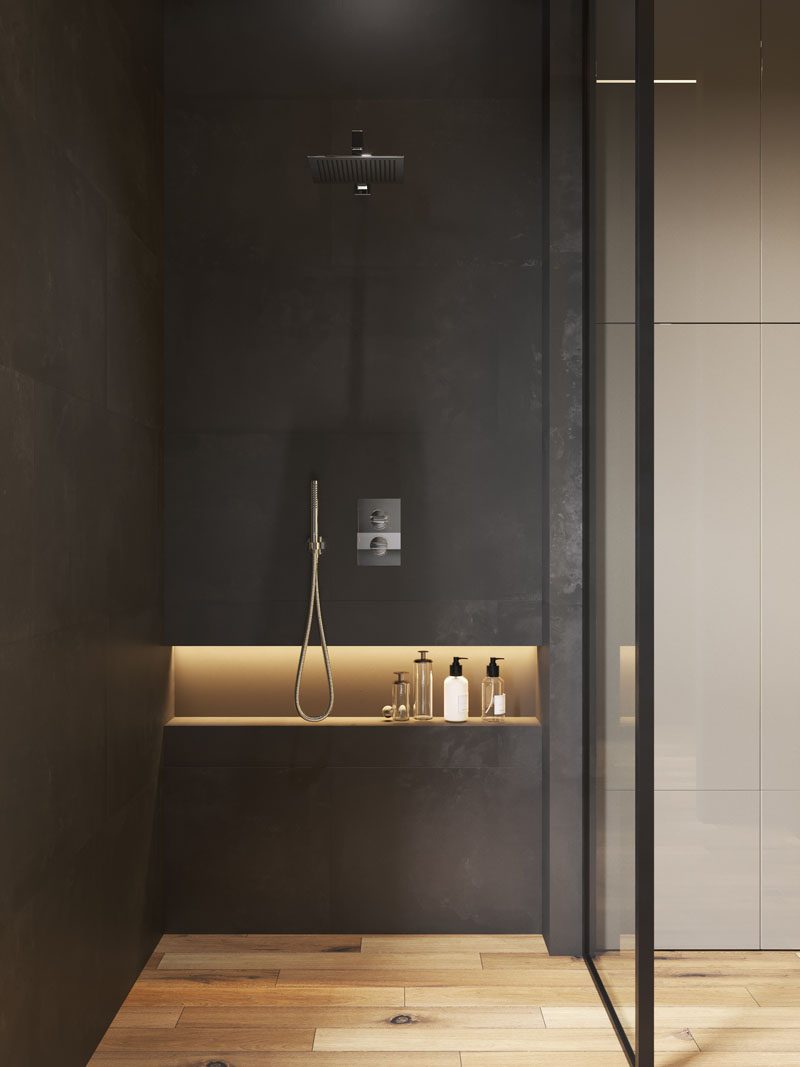 В этой современной ванной комнате есть горизонтальная душевая ниша со скрытой подсветкой для хранения вещей. #ModernBathroom #ShowerNiche #ShowerNicheIdeas #BathroomStorage