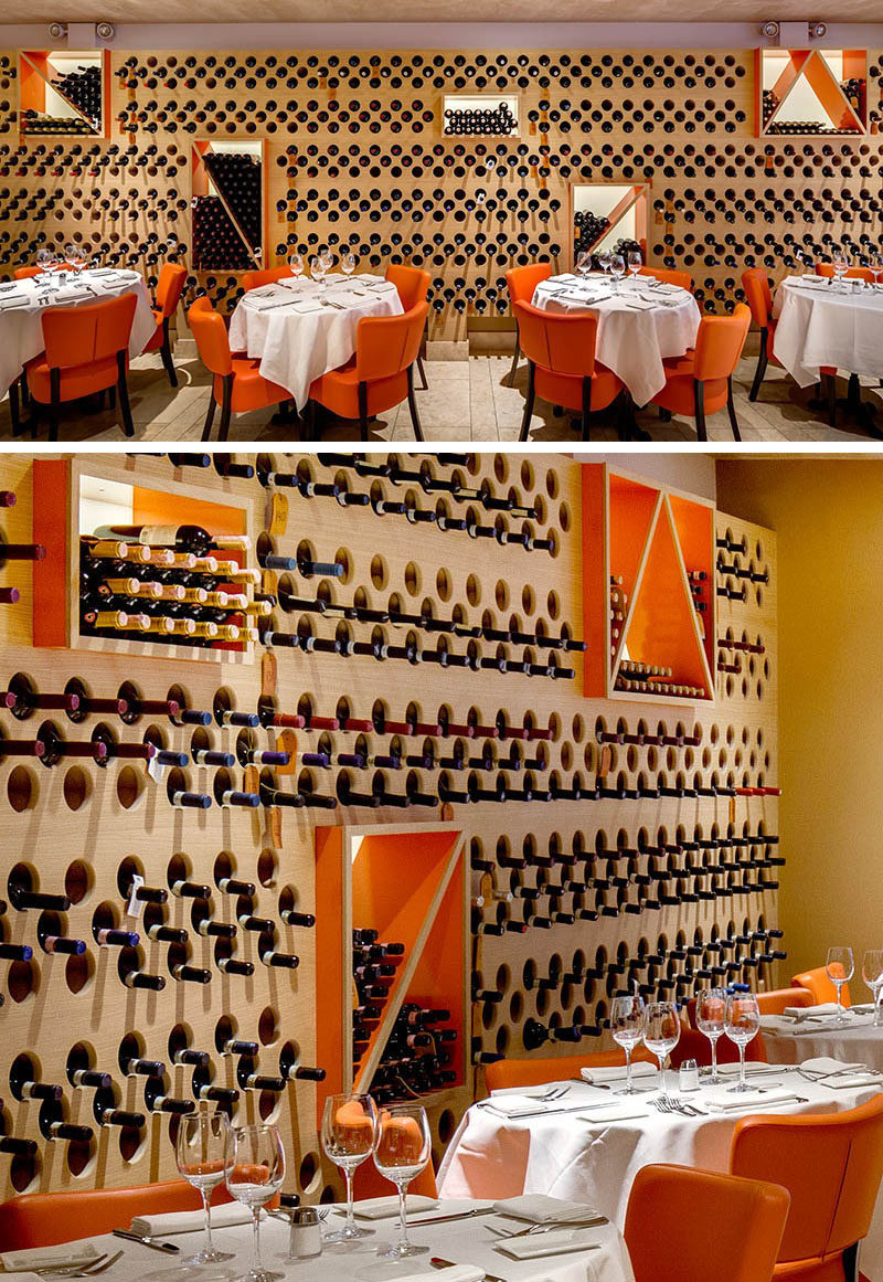 Акцентная стена ресторана была создана, превратив ее в хранилище для вина.